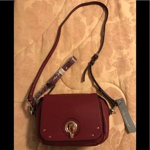 Cute purse. NWT. Burgundy red. L10 x H9 x W3.5.